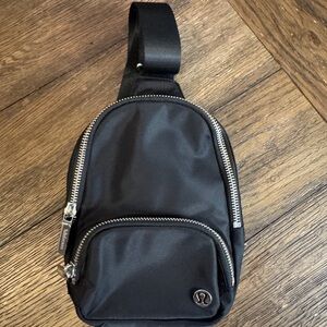 lululemon athletica Black Sling Bag with Silver Zippers
